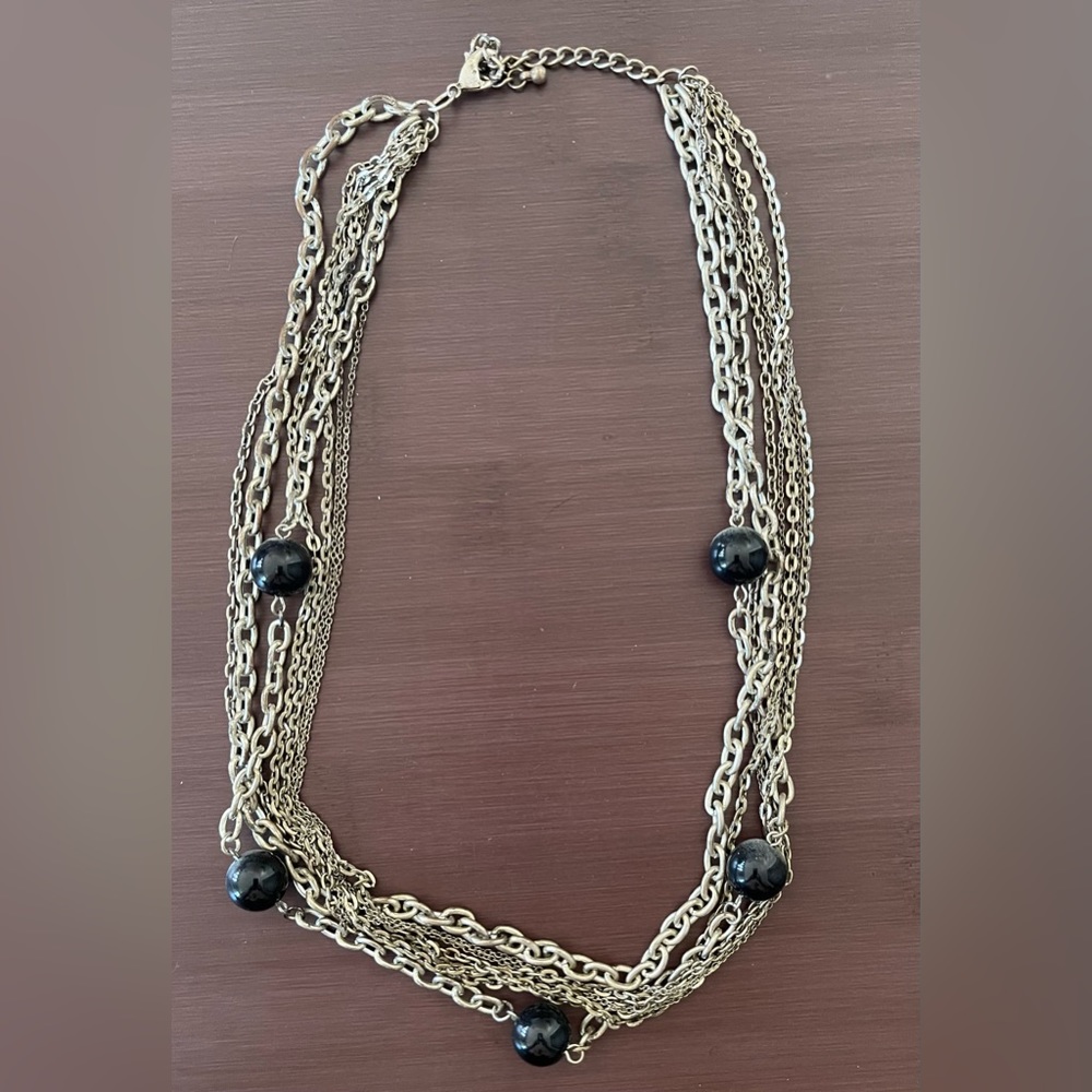 Multistrand silver necklace with black beads